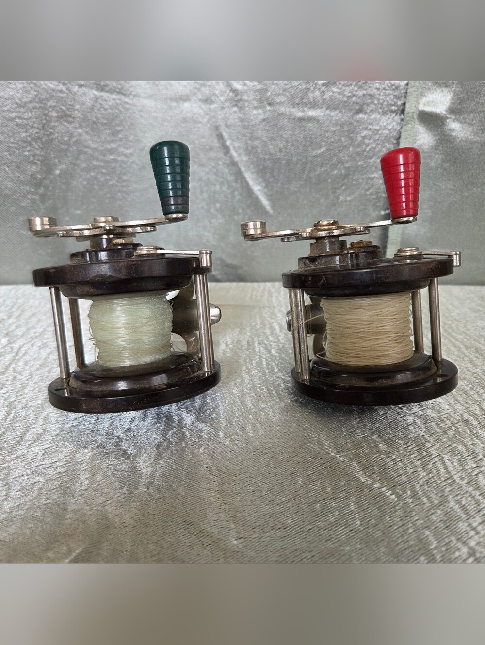 Pair of Vintage PENN #85 Fishing Reels with Red and Green Handles